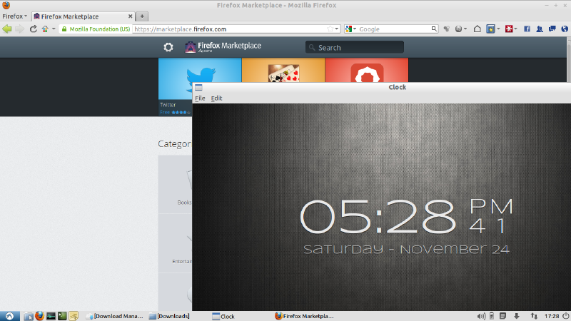 Firefox OS Clock app running on Ubuntu with Firefox Marketplace in the background